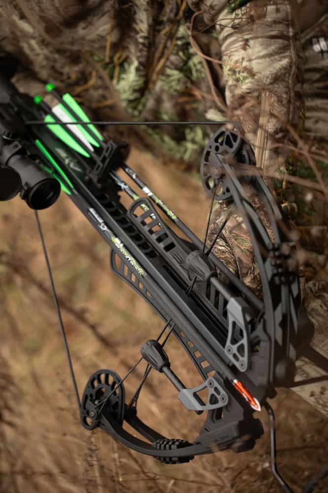 Precision compound bow with camouflage finish for bowhunting in the wild.
