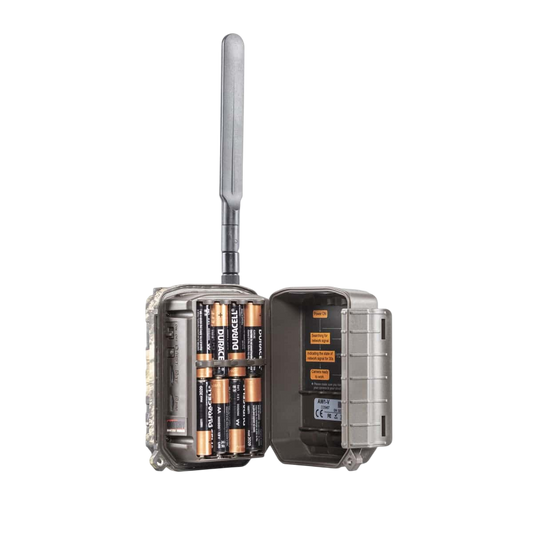 1. Wireless trail camera with antenna, battery compartment, and signal indicator.