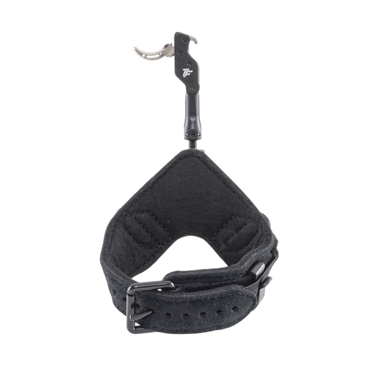 Durable archery release with adjustable strap and wrist strap for bowhunting precision.