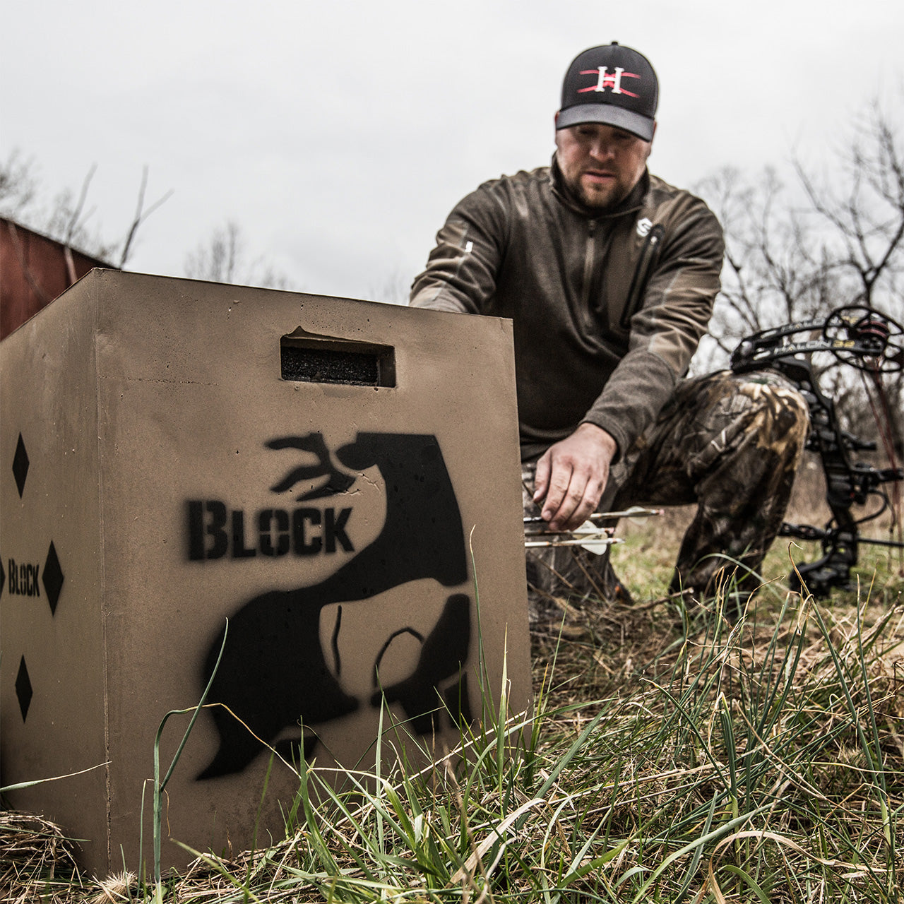 Camouflage bowhunting equipment used in outdoor archery hunting.