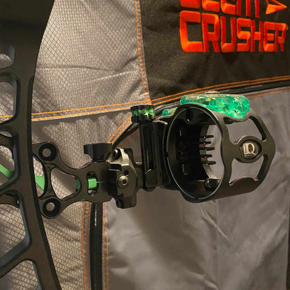 Premium compound bow sight with adjustable pins for accurate archery shots.