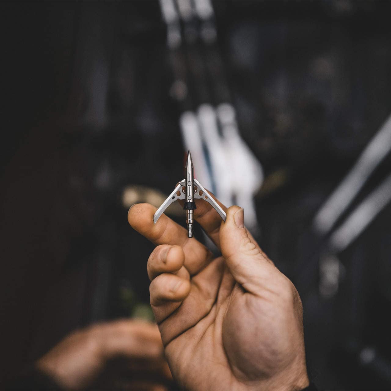 Precision archery microature arrow fletching tool for bowhunting accessories.