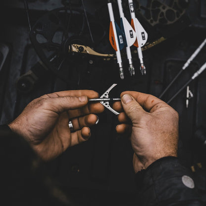 Precision bow tuning with archery tools for optimal performance.