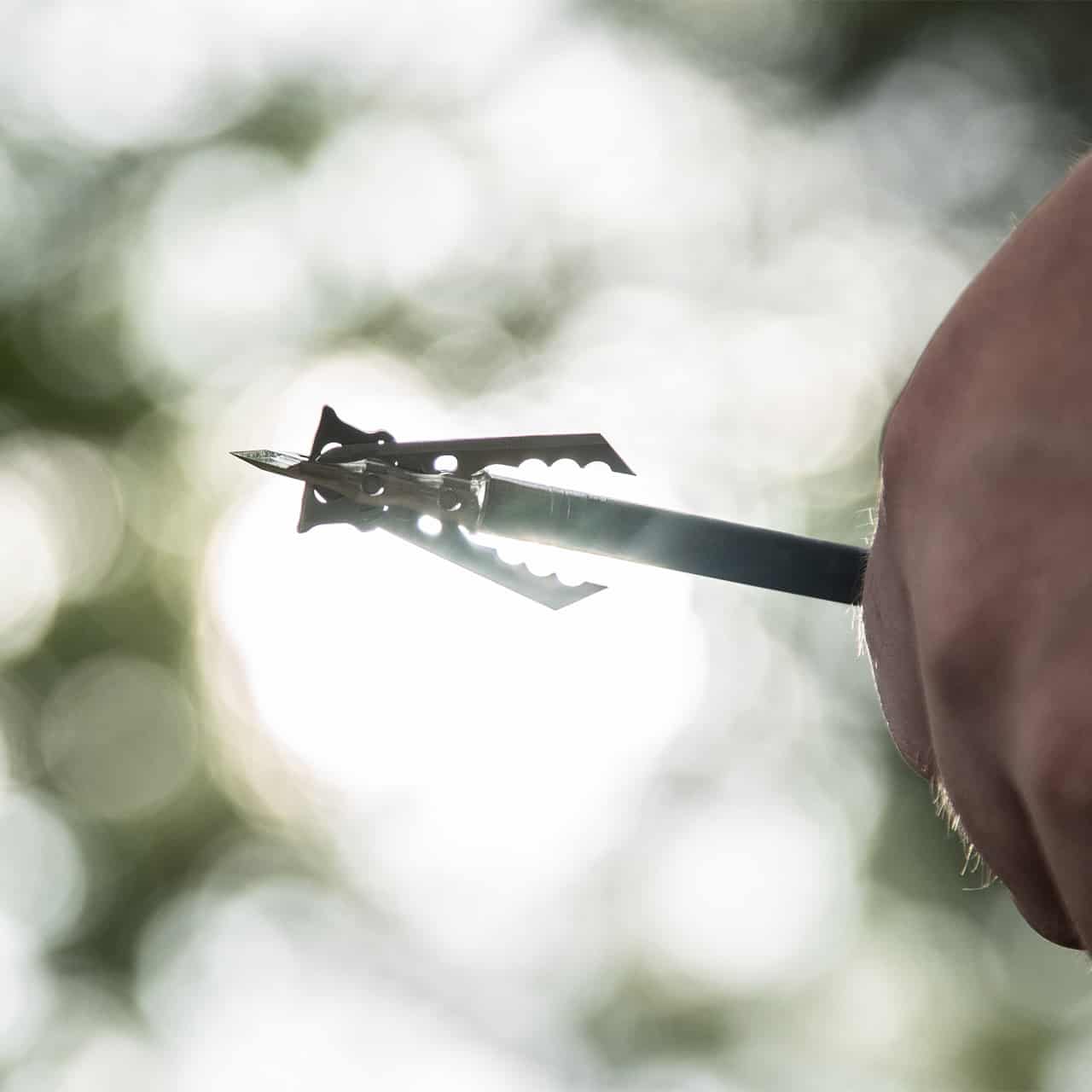High-quality arrow with broadhead mounted, ready for bowhunting in outdoor settings.