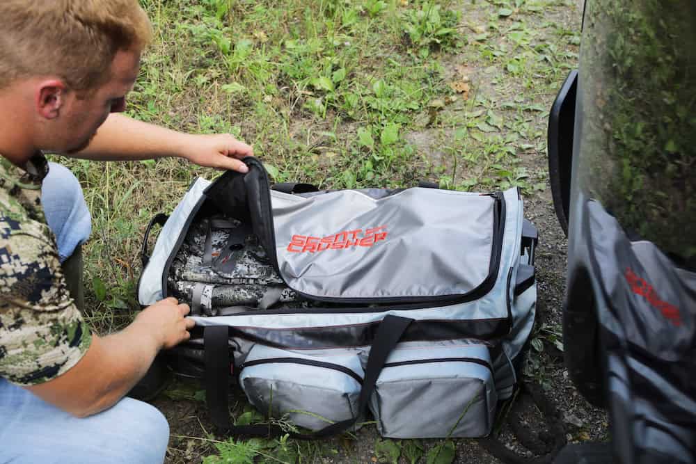 Sturdy bowhunting gear bag with multiple compartments, perfect for outdoor archery and hunting trips.