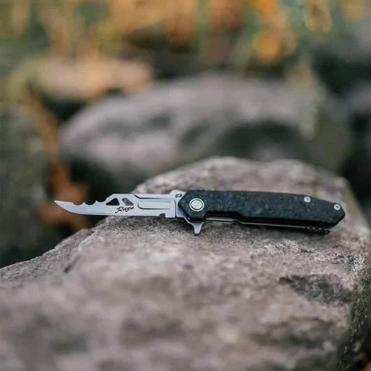 Durable outdoor folding knife with serrated blade for hunting and camping tasks.