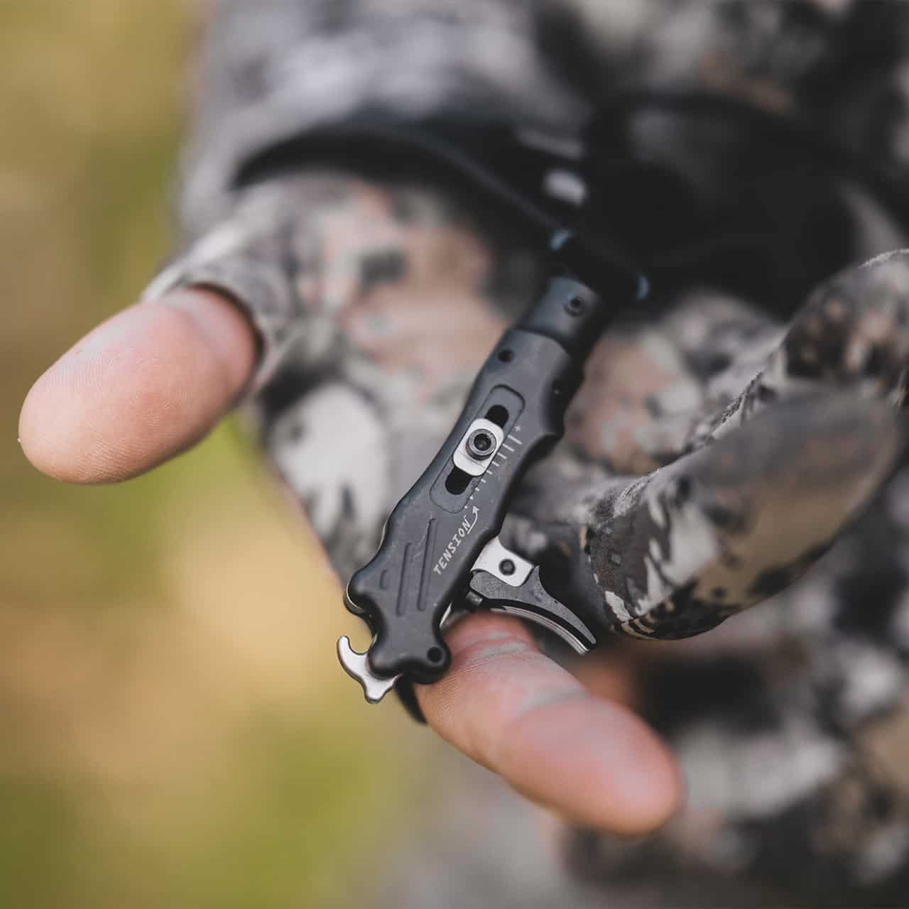 Precision archery sight with adjustable Tension Wheel and fiber optic pin for bowhunting.