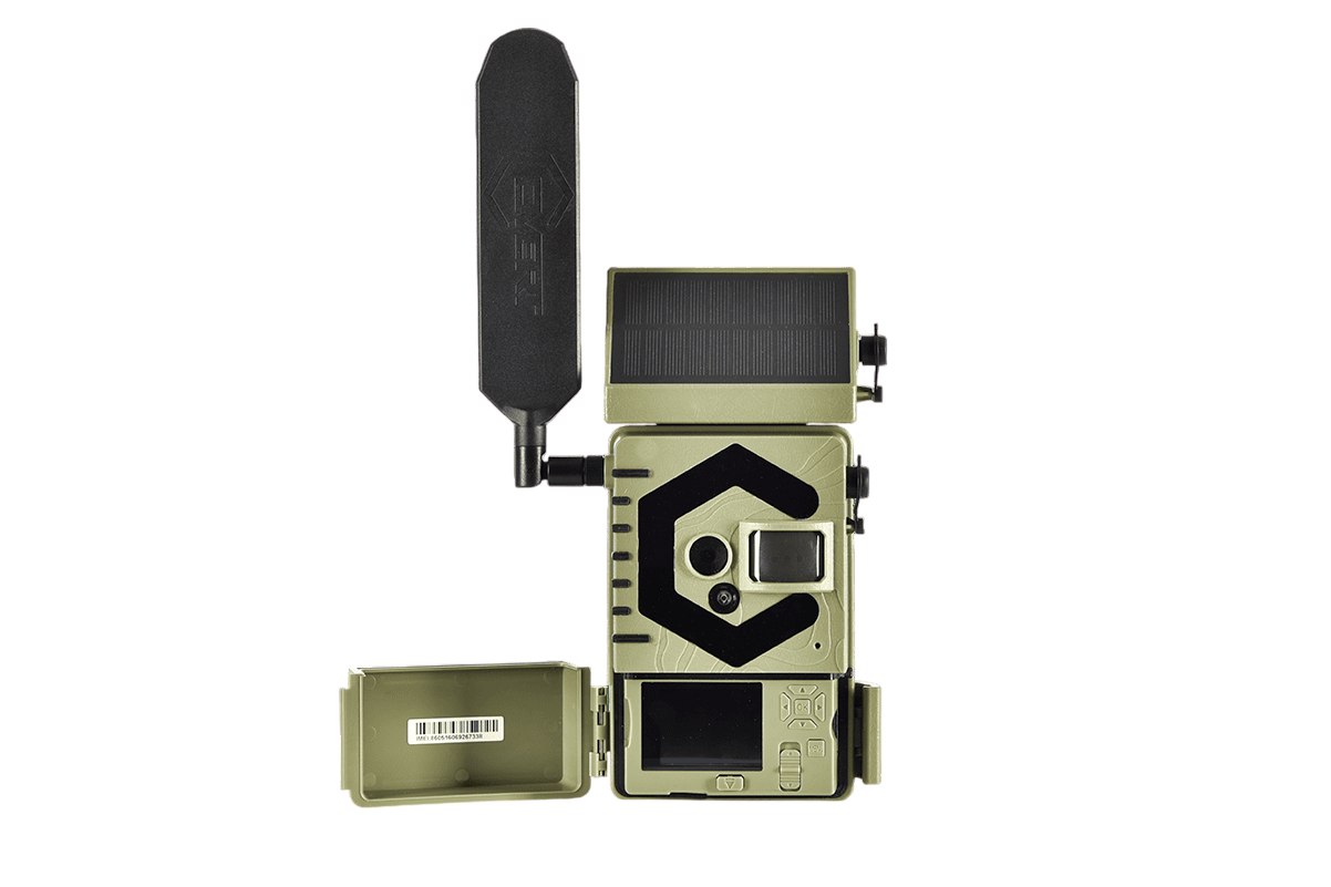 Camouflage trail camera with solar panel for outdoor wildlife monitoring and bowhunting.