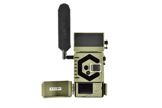 Camouflage trail camera with solar panel for outdoor wildlife monitoring and bowhunting.