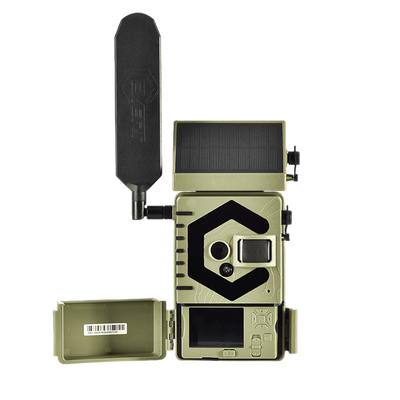 Camouflage trail camera with solar panel for outdoor wildlife monitoring and bowhunting.