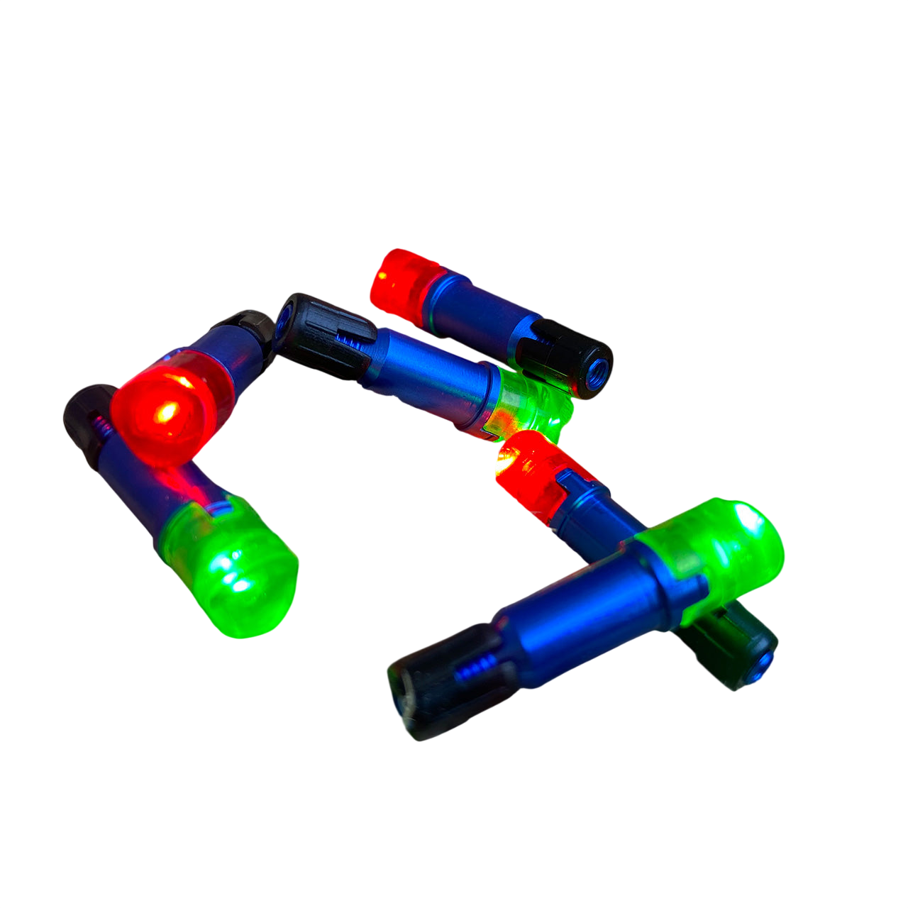 Red, blue, green, and black LED lights in a wooden crack with chopped wood surrounding it.