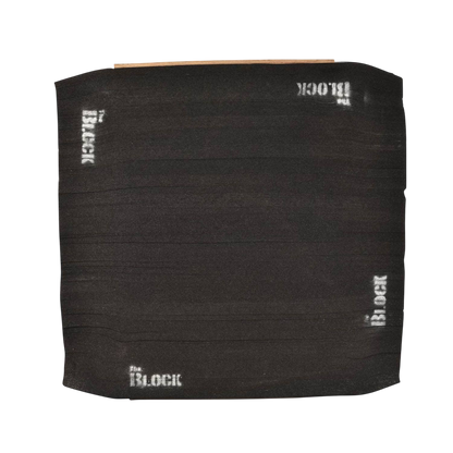 Black archery target block with white "Block" logos and textured surface for bowhunting practice.
