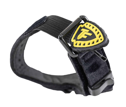 Flexible archery release buckle with FeraDyne logo for secure shooting aid.