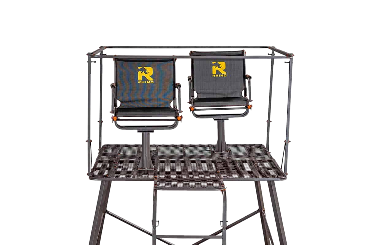 Dual hunting chairs mounted on a sturdy platform with a protective frame, ideal for outdoor archery and bowhunting.