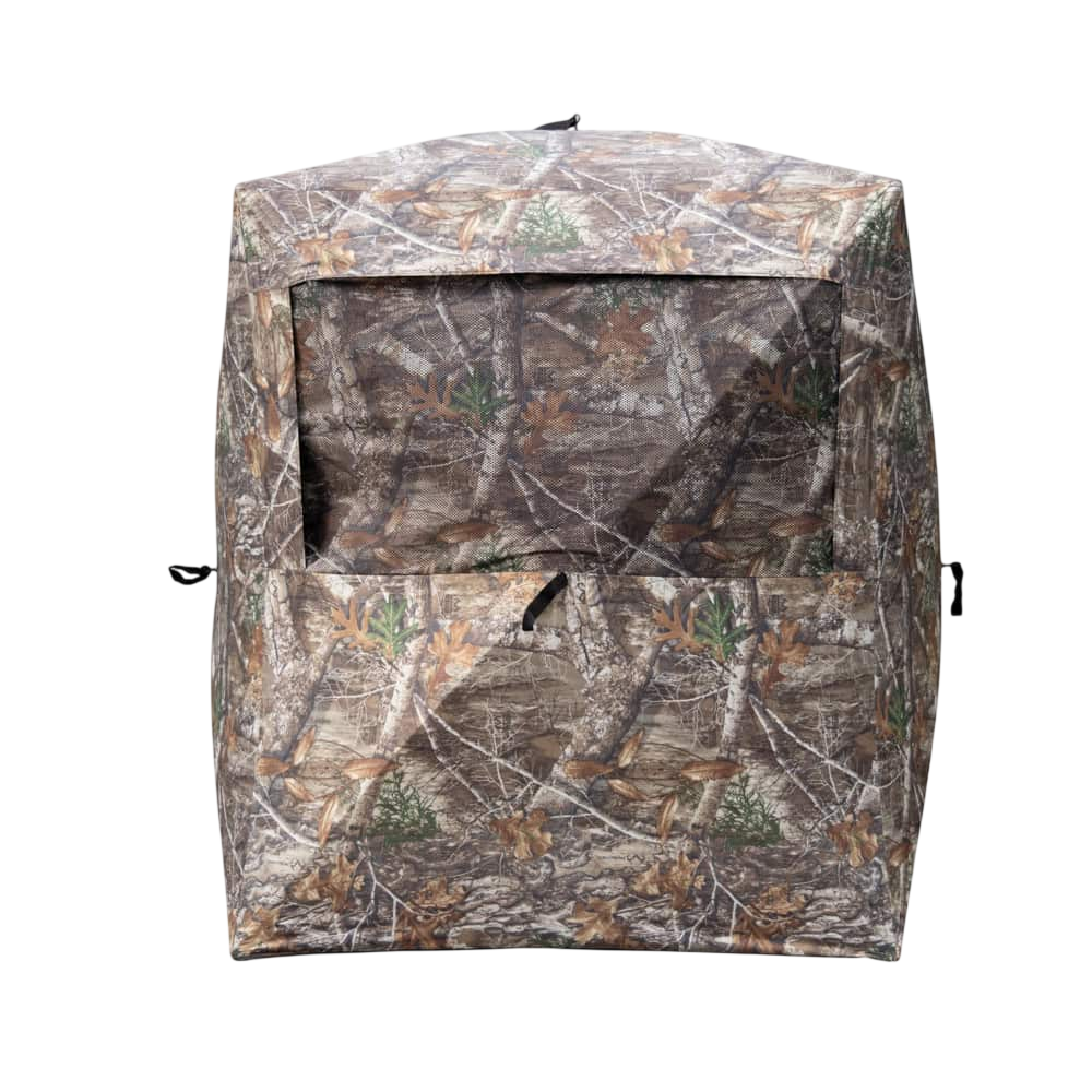 Camouflage hunting blind for bowhunting and outdoor wildlife observation.