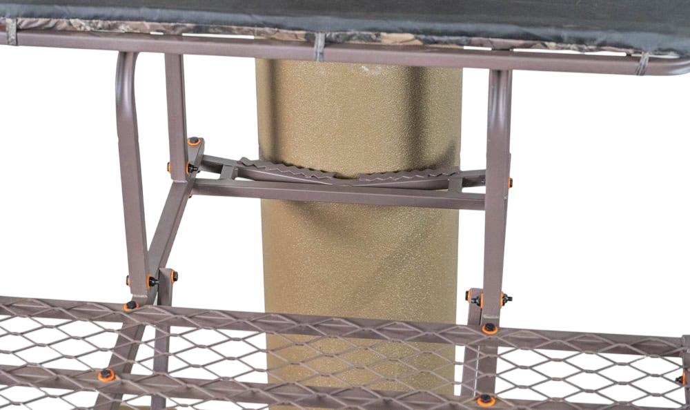 Adjustable hunting stand with safety step and platform for outdoor bowhunting.