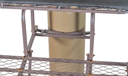 Adjustable hunting stand with safety step and platform for outdoor bowhunting.