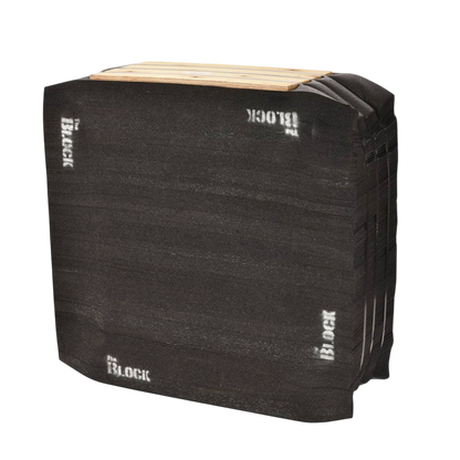 Black archery target foam block for bowhunting practice and training outdoors.