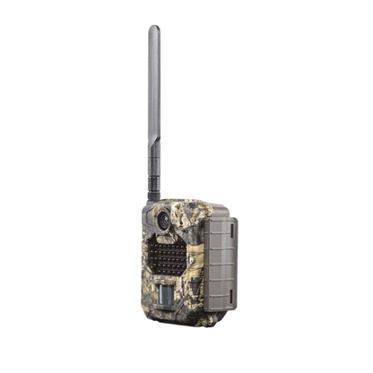 Trail camera with camouflage pattern and long antenna for outdoor wildlife monitoring.