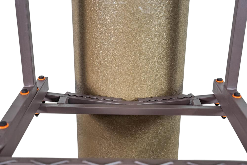 Adjustable tree stand platform with padded footrest for hunting comfort and stability.