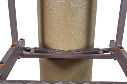 Adjustable tree stand platform with padded footrest for hunting comfort and stability.