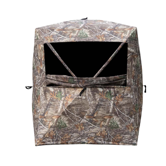 Camouflage bowhunting blind for outdoor archery and hunting adventures.