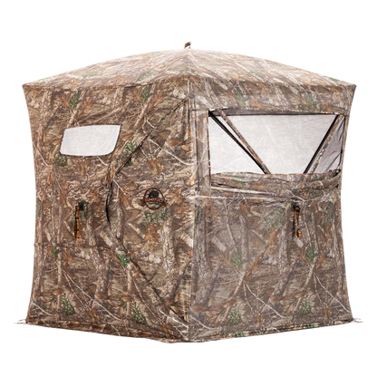 Camouflage hunting blind tent with mesh windows and zippers for bowhunting adventures.