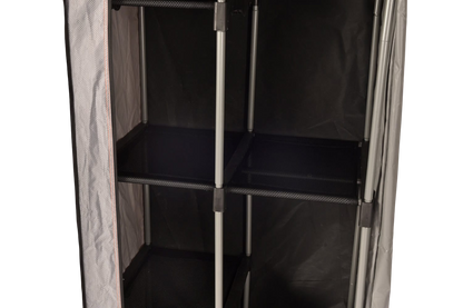 Adjustable metal shelving unit inside a portable outdoor storage tent.