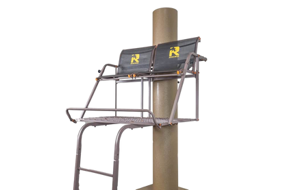 Elevated deer stand with safety features and logo, mounted on a pole for hunting convenience.