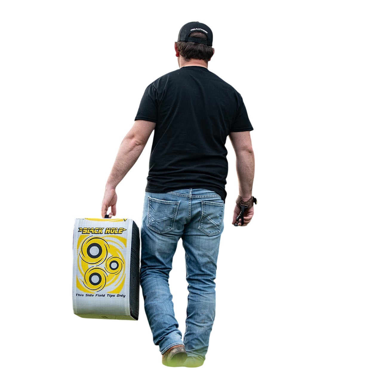 Target practice with archery training target at outdoor field, man carrying shooting supplies, focus on archery equipment.
